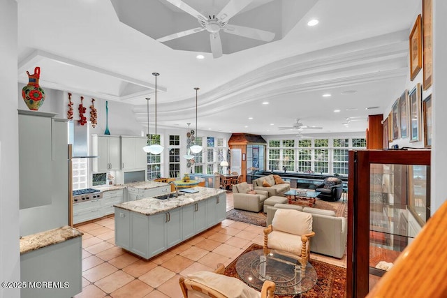 kitchen featuring a sink, ceiling fan, stainless steel gas cooktop, and recessed lighting