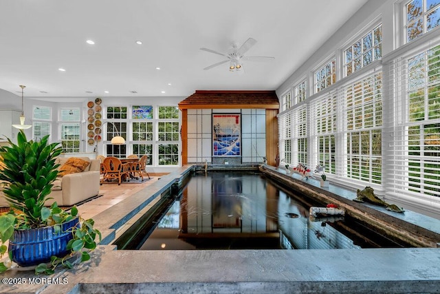 sunroom / solarium with plenty of natural light