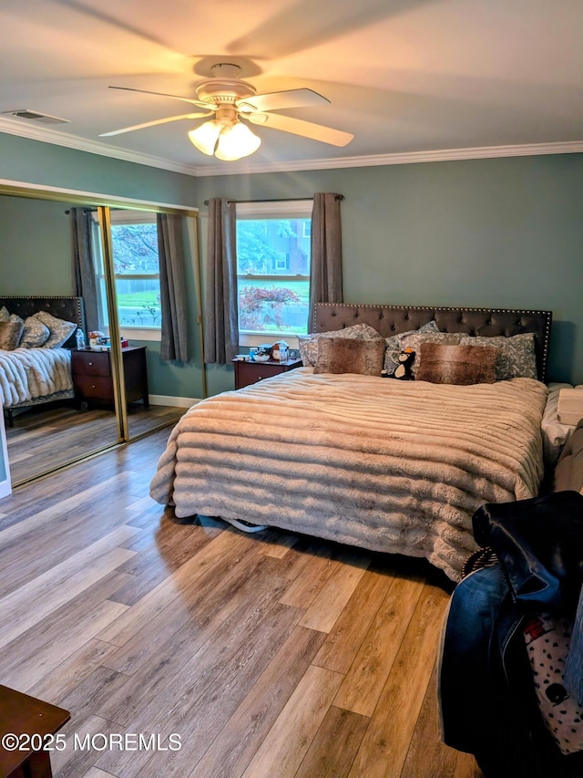 59 Chilton Ln, Aberdeen, NJ 07747 - bedroom with wood finished floors, ornamental molding, and a ceiling fan
