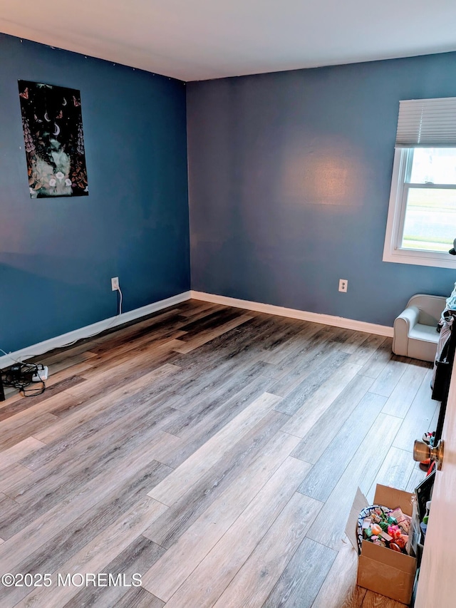 59 Chilton Ln, Aberdeen, NJ 07747 - spare room with wood finished floors and baseboards