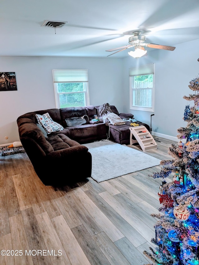 59 Chilton Ln, Aberdeen, NJ 07747 - living room featuring wood finished floors and ceiling fan