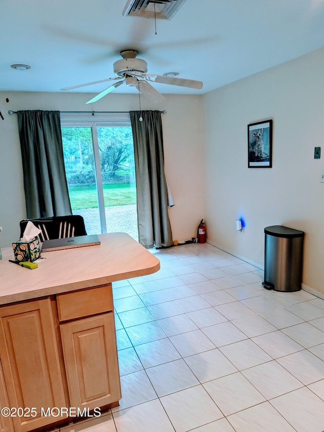 59 Chilton Ln, Aberdeen, NJ 07747 - kitchen with light brown cabinetry, ceiling fan, light countertops, and light tile patterned floors