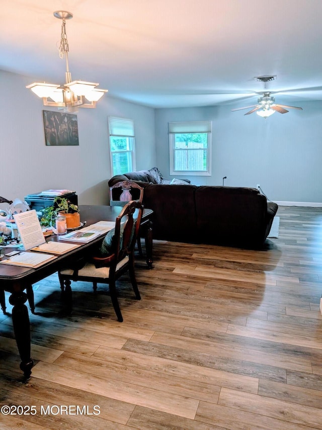 59 Chilton Ln, Aberdeen, NJ 07747 - dining room featuring a chandelier, light wood finished floors, and ceiling fan