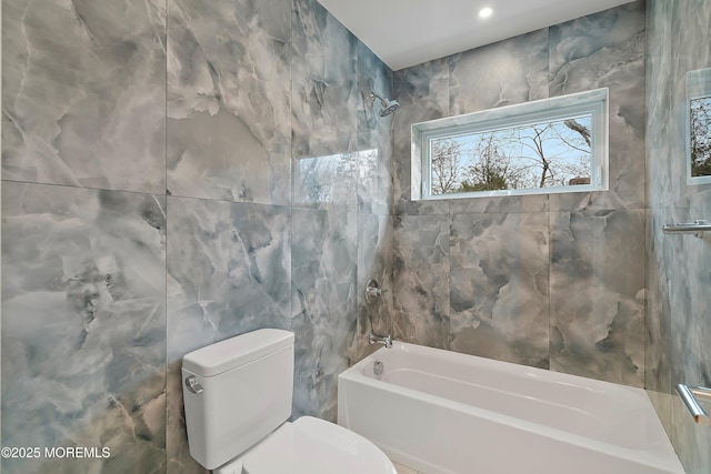 bathroom featuring tile walls, shower / bath combination, recessed lighting, and toilet