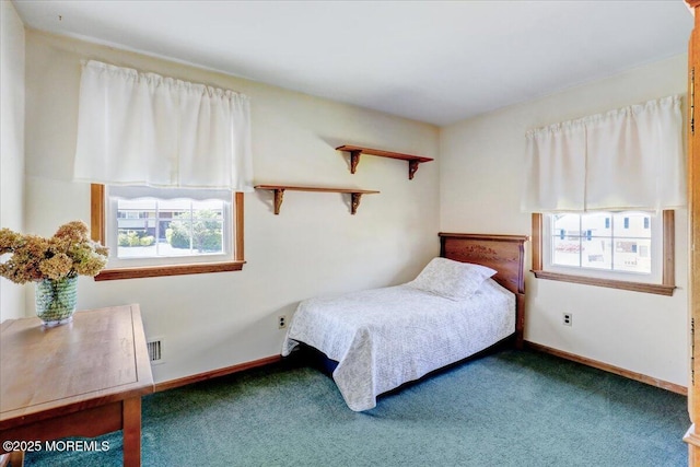 bedroom featuring visible vents, carpet flooring, baseboards, and multiple windows
