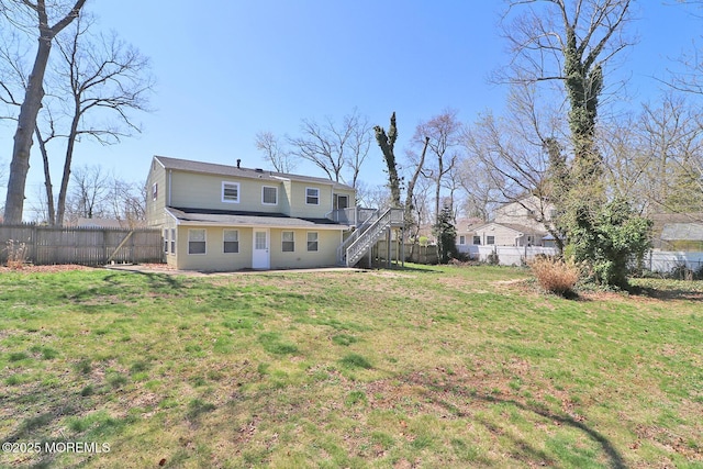 330 Dallas Dr, Toms River, NJ 08753 - back of house with a yard, roof with shingles, a fenced backyard, and stairway