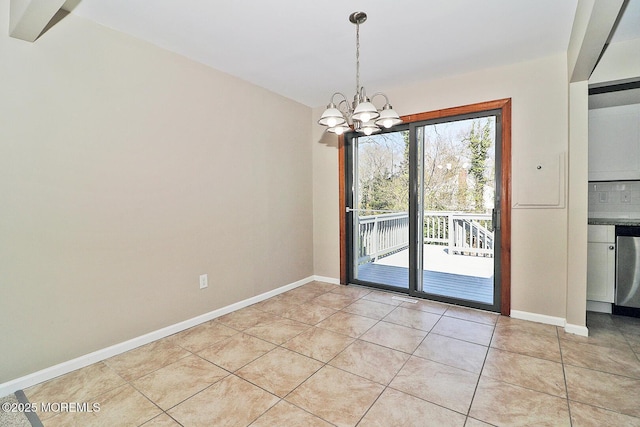 330 Dallas Dr, Toms River, NJ 08753 - unfurnished dining area featuring an inviting chandelier, light tile patterned flooring, and baseboards
