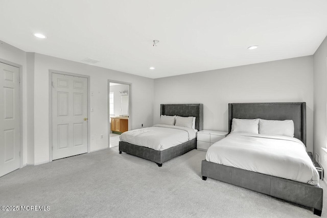 bedroom featuring carpet floors, recessed lighting, connected bathroom, and visible vents