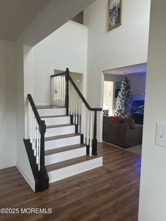 4 Christopher Dr, Howell, NJ 07731 - stairs with wood finished floors, a towering ceiling, and baseboards