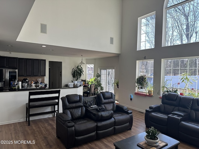 4 Christopher Dr, Howell, NJ 07731 - living room featuring visible vents, a towering ceiling, baseboards, and dark wood-style flooring