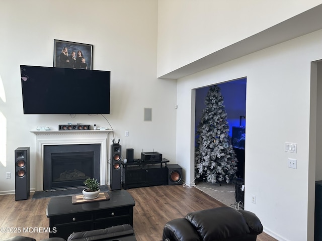4 Christopher Dr, Howell, NJ 07731 - living area with baseboards, wood finished floors, and a fireplace