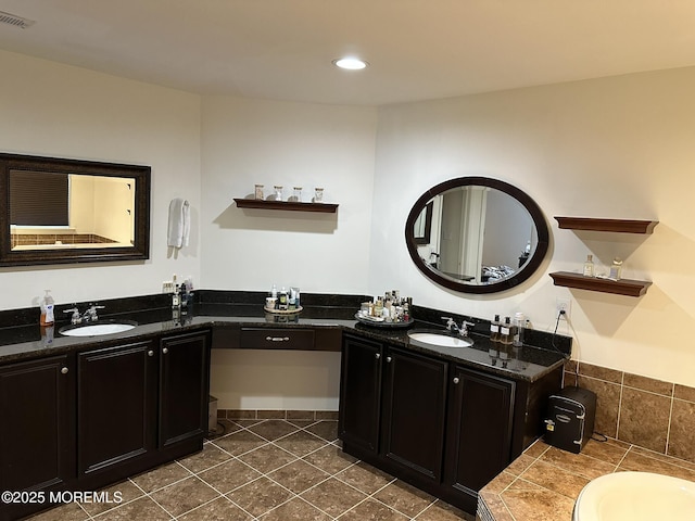 4 Christopher Dr, Howell, NJ 07731 - bathroom featuring two vanities, visible vents, tile patterned flooring, and a sink