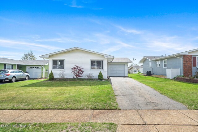 37 Central Blvd, Brick, NJ 08724 - ranch-style home featuring an attached garage, central AC, a front yard, and aphalt driveway