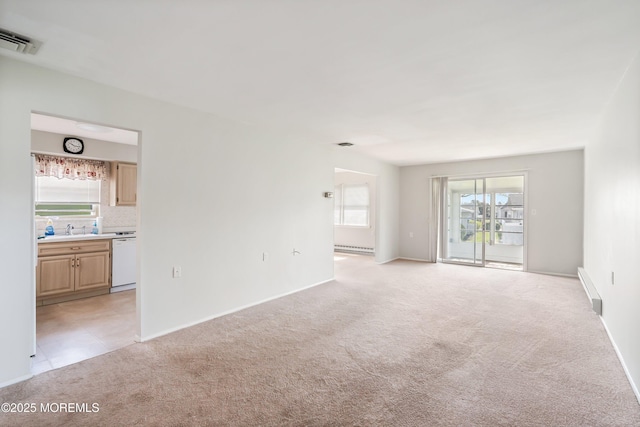 37 Central Blvd, Brick, NJ 08724 - unfurnished living room featuring baseboards, visible vents, light colored carpet, and a wealth of natural light