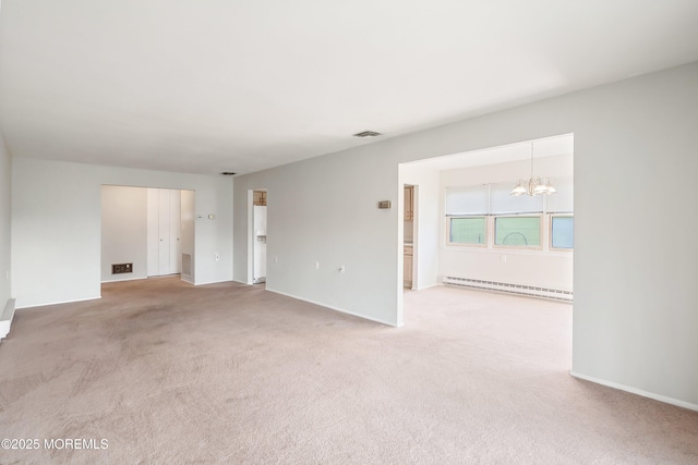 37 Central Blvd, Brick, NJ 08724 - empty room featuring carpet, baseboard heating, baseboards, and an inviting chandelier