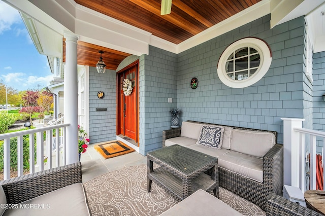 view of patio featuring covered porch and an outdoor living space