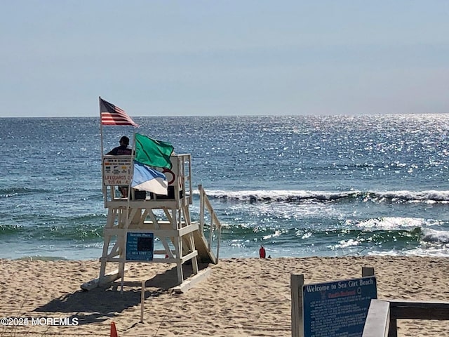 property view of water with a beach view