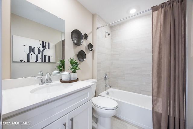 full bath with vanity, toilet, and shower / bath combination with curtain