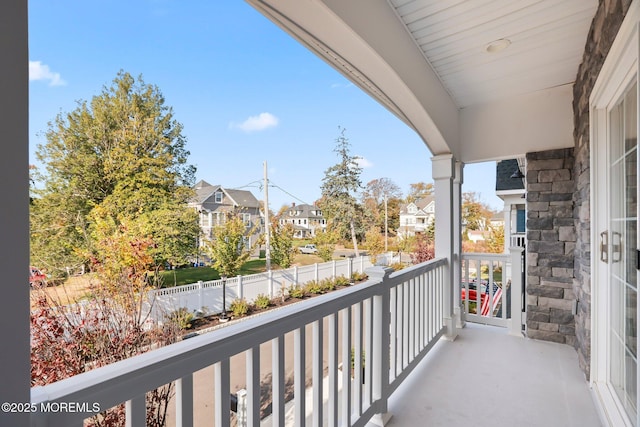 balcony featuring a residential view