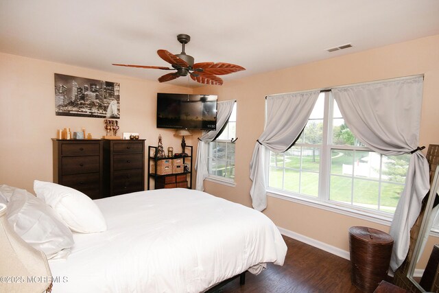 83 Nathan Blvd Unit 35, Sayreville, NJ 08859 - bedroom featuring baseboards, a ceiling fan, visible vents, and dark wood finished floors