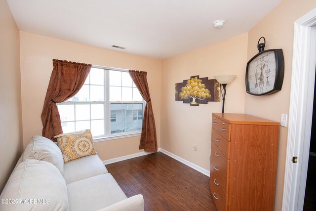 83 Nathan Blvd Unit 35, Sayreville, NJ 08859 - living area featuring baseboards, visible vents, and dark wood-type flooring