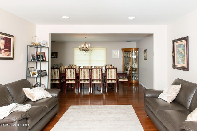 1150 Buckwald Ct, Lakewood, NJ 08701 - living room with baseboards, recessed lighting, a notable chandelier, and dark wood-style flooring