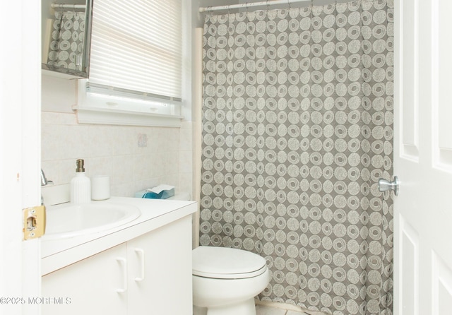 1150 Buckwald Ct, Lakewood, NJ 08701 - full bath featuring vanity, toilet, and tile walls