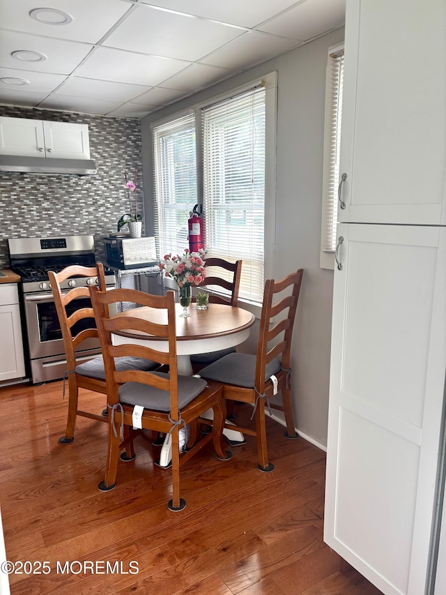 37 Belshaw Ave, Shrewsbury Twp, NJ 07724 - dining space with a paneled ceiling and light wood-style floors