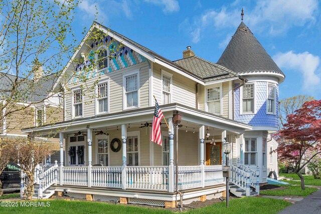 44 Irving Pl, Red Bank, NJ 07701 - victorian house featuring a chimney, a ceiling fan, and covered porch