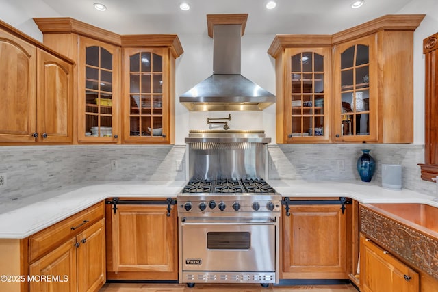 44 Irving Pl, Red Bank, NJ 07701 - kitchen with island range hood, decorative backsplash, designer range, and glass insert cabinets