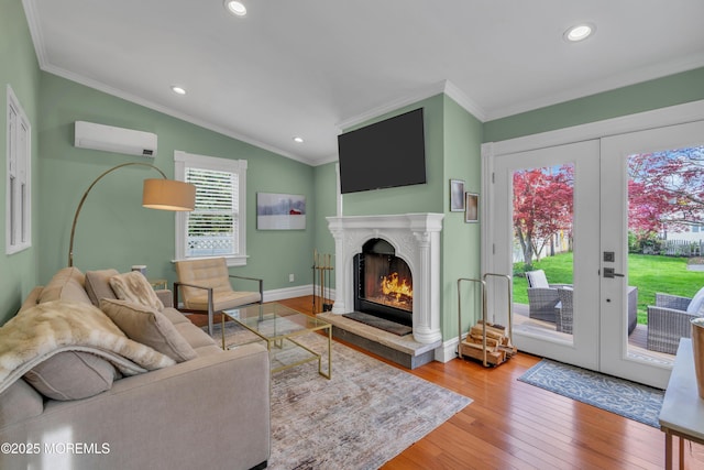 44 Irving Pl, Red Bank, NJ 07701 - living area with plenty of natural light, wood-type flooring, a wall unit AC, and crown molding