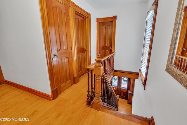 44 Irving Pl, Red Bank, NJ 07701 - hall featuring light wood-style flooring, baseboards, and an upstairs landing