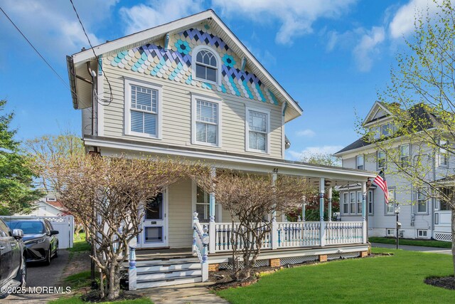 44 Irving Pl, Red Bank, NJ 07701 - view of front of property featuring a front lawn and covered porch