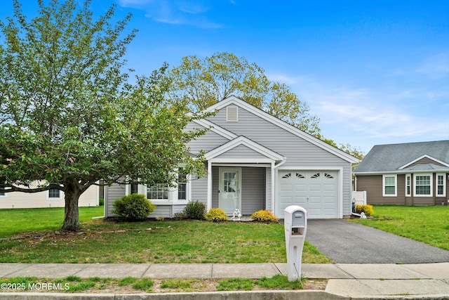 26 Dogwood Dr, Barnegat, NJ 08005 - view of front of property featuring a garage, asphalt driveway, and a front lawn