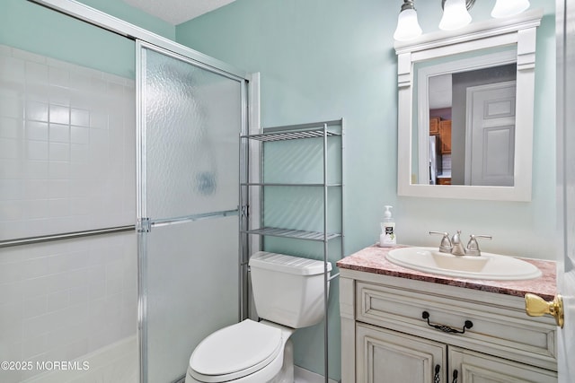 26 Dogwood Dr, Barnegat, NJ 08005 - full bathroom featuring a shower stall, toilet, and vanity