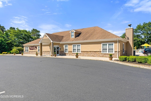 26 Dogwood Dr, Barnegat, NJ 08005 - view of front of house with stone siding and a chimney