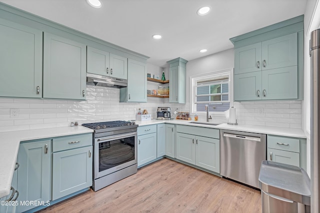 316 Rte 37, Seaside Heights, NJ 08751 - kitchen with stainless steel appliances, under cabinet range hood, light countertops, and a sink