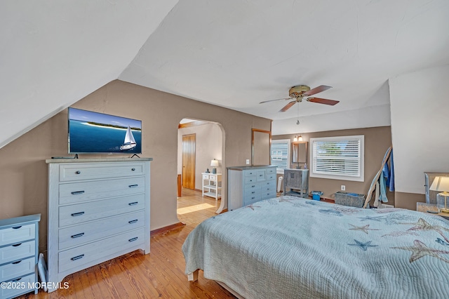 316 Rte 37, Seaside Heights, NJ 08751 - bedroom with ensuite bath, light wood-type flooring, a ceiling fan, vaulted ceiling, and arched walkways