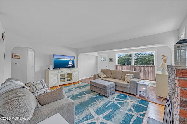 316 Rte 37, Seaside Heights, NJ 08751 - living area featuring arched walkways and wood finished floors