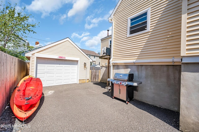 316 Rte 37, Seaside Heights, NJ 08751 - detached garage featuring fence and driveway