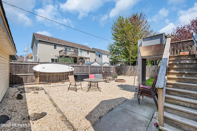 316 Rte 37, Seaside Heights, NJ 08751 - view of yard with a patio, stairway, a fenced backyard, and an outdoor fire pit