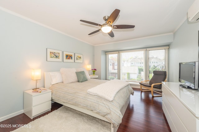 bedroom featuring crown molding, baseboards, a wall unit AC, and dark wood-type flooring