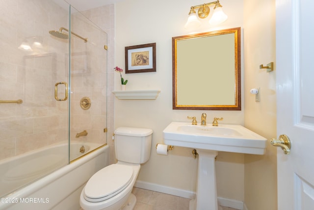 full bath featuring baseboards,  shower combination, tile patterned floors, and toilet