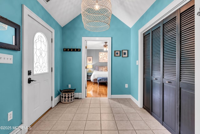 109 Capstan Ave, Beachwood, NJ 08722 - foyer with vaulted ceiling, a ceiling fan, light tile patterned floors, and baseboards