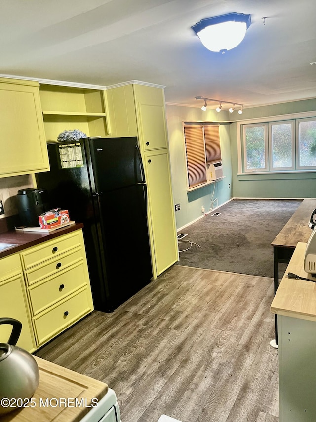 5 B Trl, Brick, NJ 08724 - kitchen with green cabinets, wood finished floors, ornamental molding, freestanding refrigerator, and rail lighting