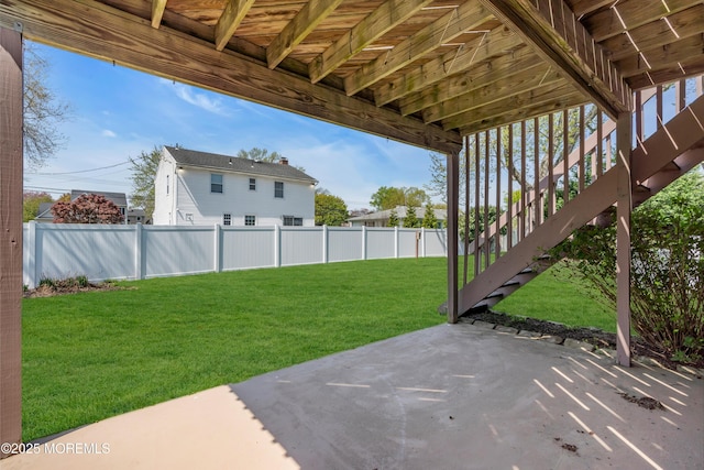 exterior space with a patio area and a fenced backyard