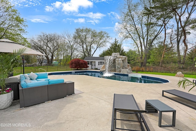 view of pool with a fenced backyard, an outdoor structure, an exterior structure, a patio, and outdoor lounge area
