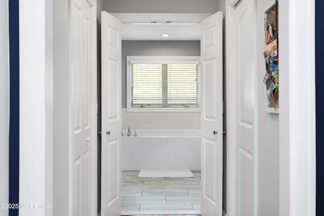 bathroom with a bath