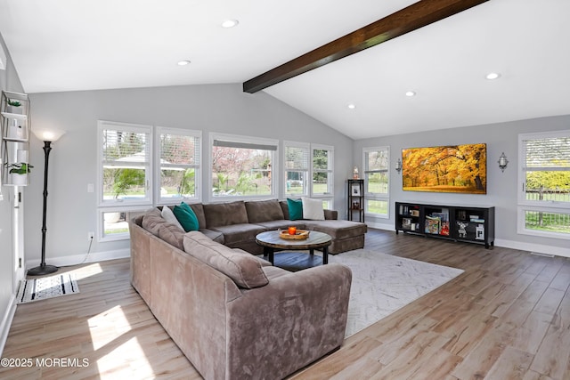 living area with baseboards, light wood-type flooring, lofted ceiling with beams, and recessed lighting
