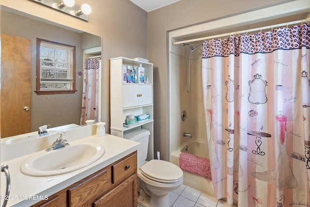 bathroom featuring tile patterned floors, shower / bath combo with shower curtain, toilet, and vanity
